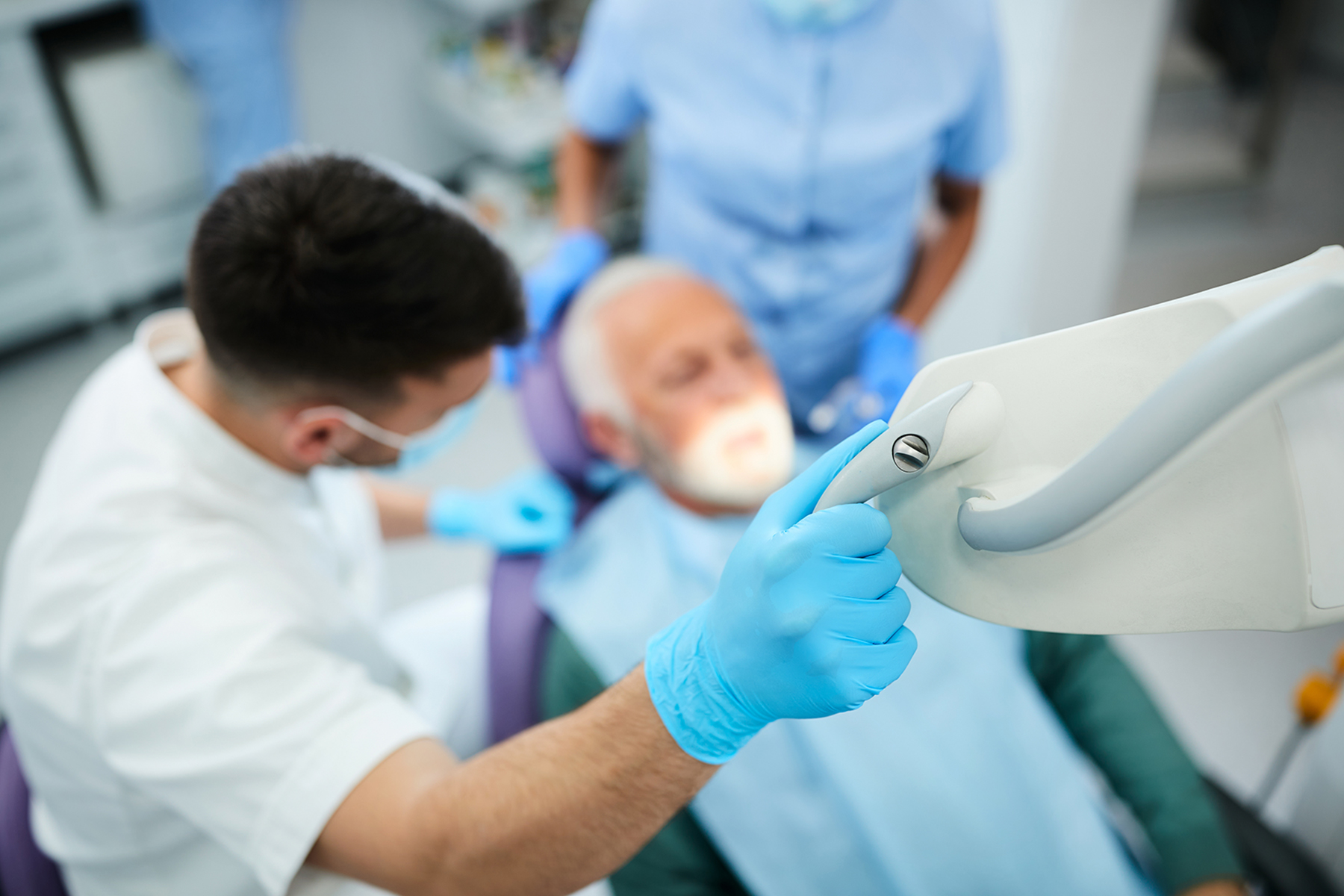 Man getting a restorative dental procedure in Canton, OH