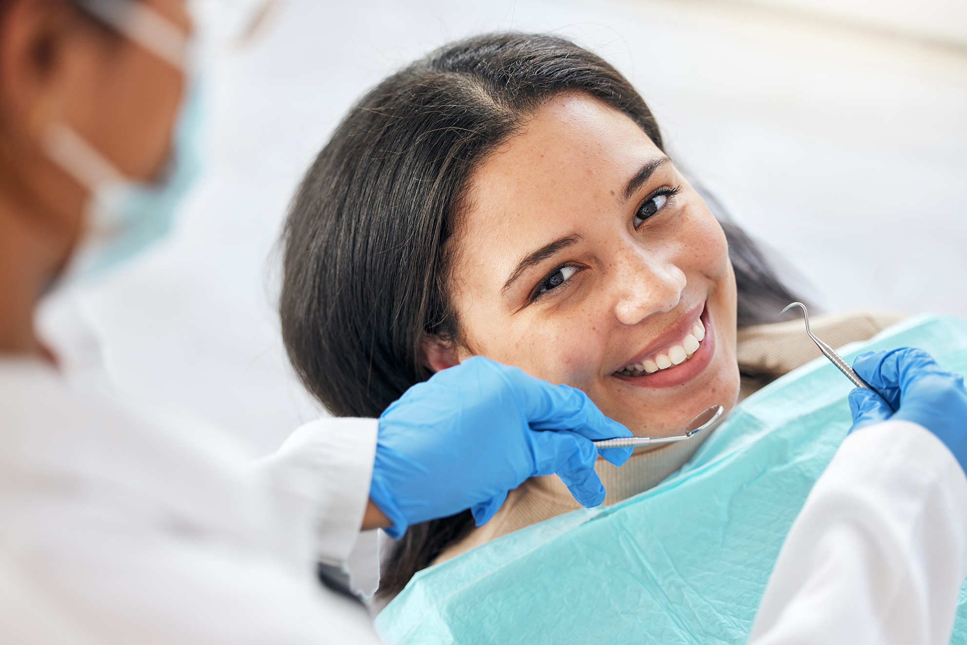 adult woman during teeth bonding dental appointment at minter dentistry