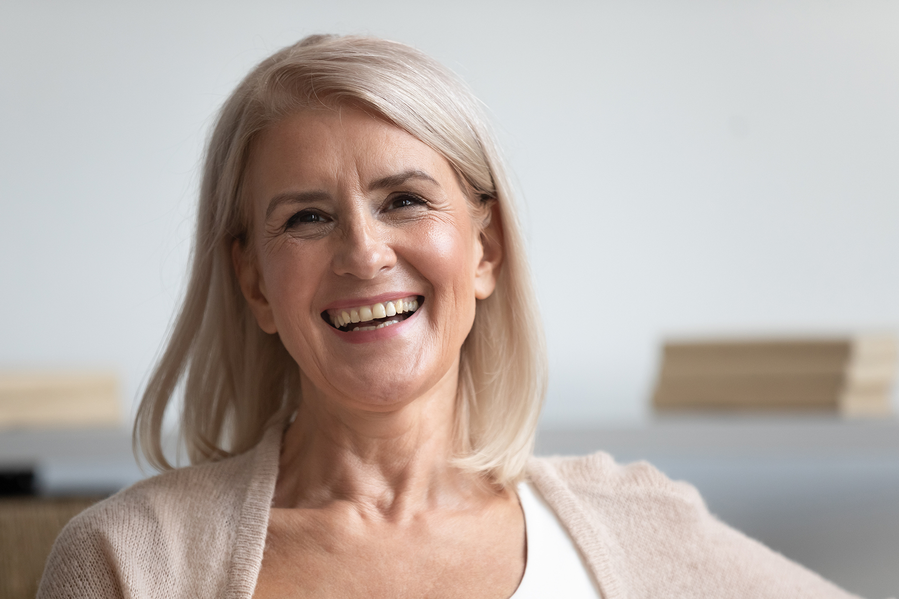 Woman smiling after oral sedation dentist in Canton, OH